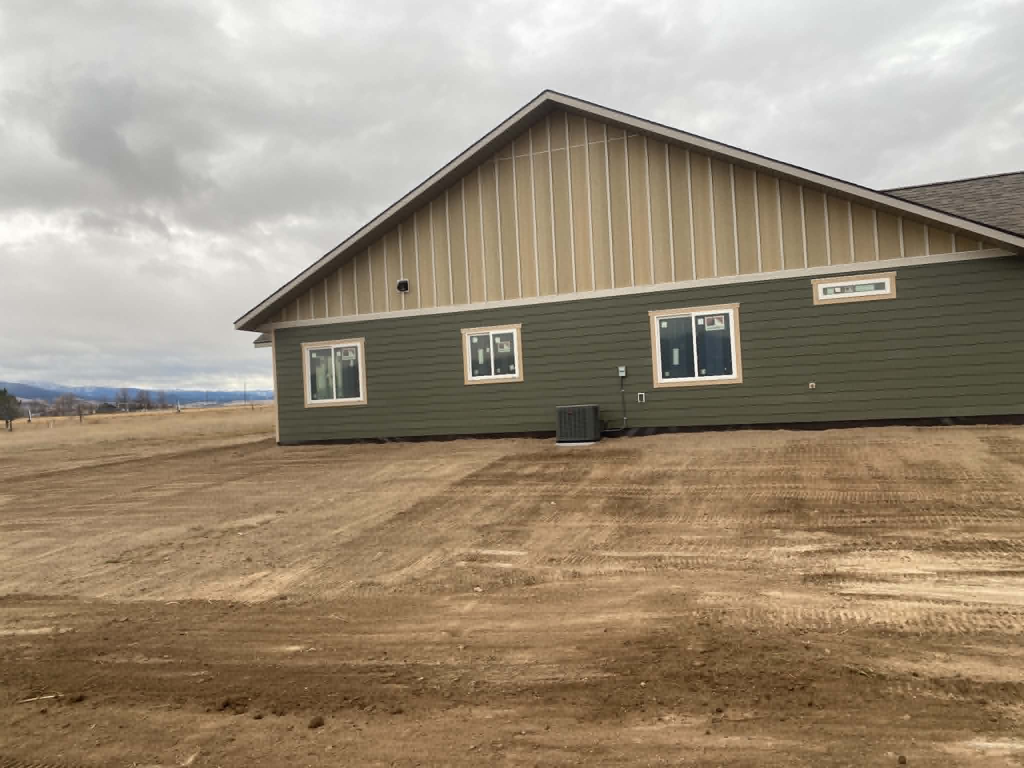 Finished site work next to new Montana home